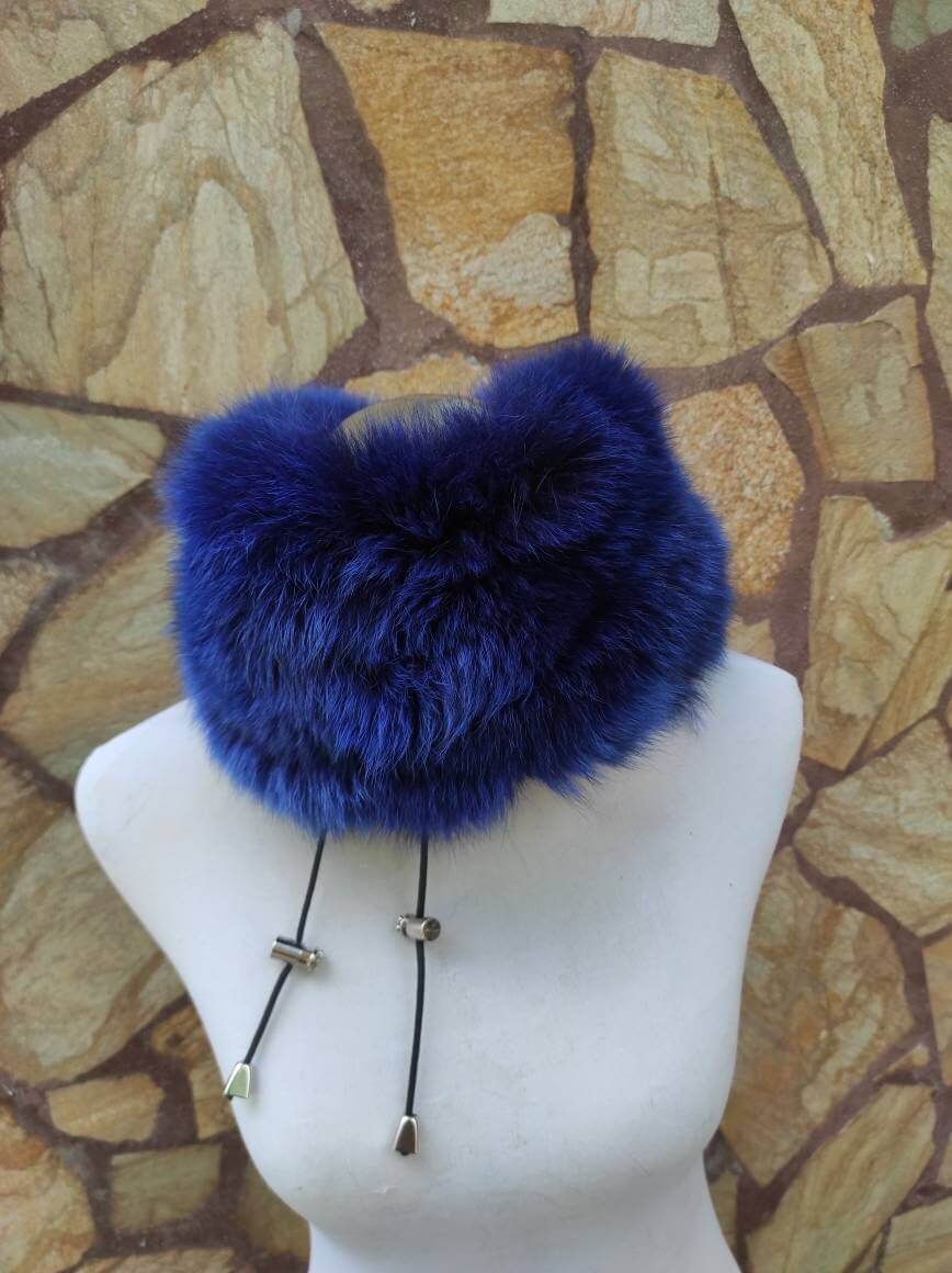 Fox Fur Scarf Neck Warmer Blue - Tatifurs displayed on a mannequin against a stone background.