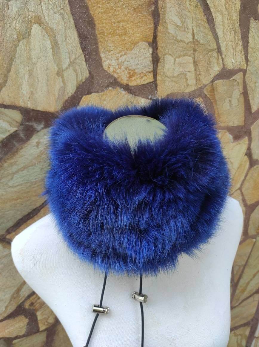 Fox Fur Scarf Neck Warmer Blue - Tatifurs showcased on a mannequin against a textured wall background.