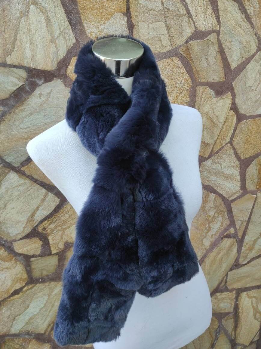 Rex Rabbit Fur Scarf Navy Blue - Tatifurs displayed draped on a mannequin against a textured stone background.