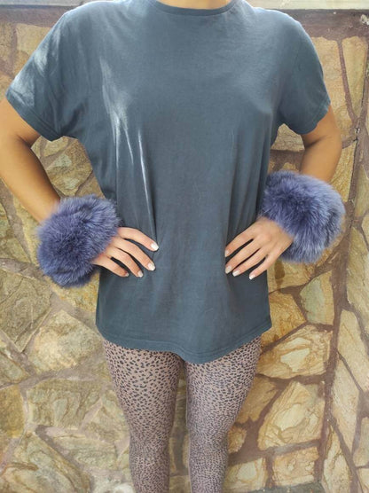 Purple Fox Fur Cuffs – 100% Real Fur - Tatifurs on model, showcasing elegant purple fur wrapped around wrists.