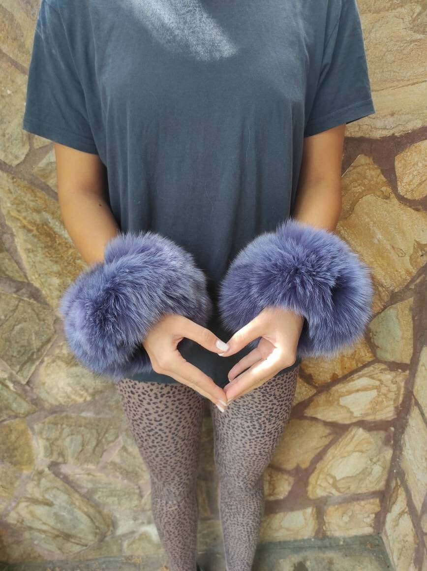 Purple Fox Fur Cuffs – 100% Real Fur - Tatifurs worn by a person, showcasing elegant purple fox fur.