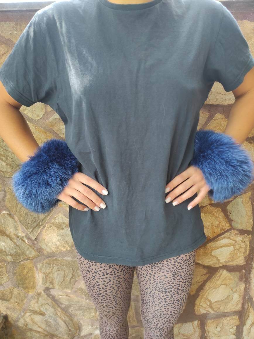 Blue Fox Fur Cuffs - Tatifurs showcasing vivid blue fur on the wrists, enhancing style and vibrancy.