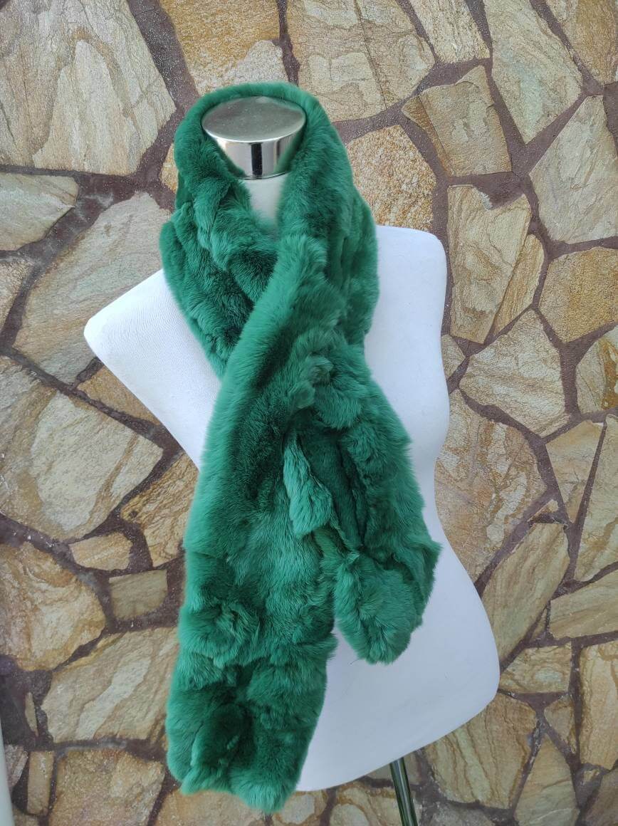 Rex Rabbit Fur Scarf Green - Tatifurs displayed on a mannequin, showcasing its luxurious velvety softness and rich green color.