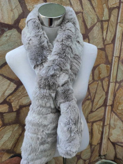 Rex Rabbit Fur Scarf Light Gray - Tatifurs displayed on a mannequin against a textured stone background.
