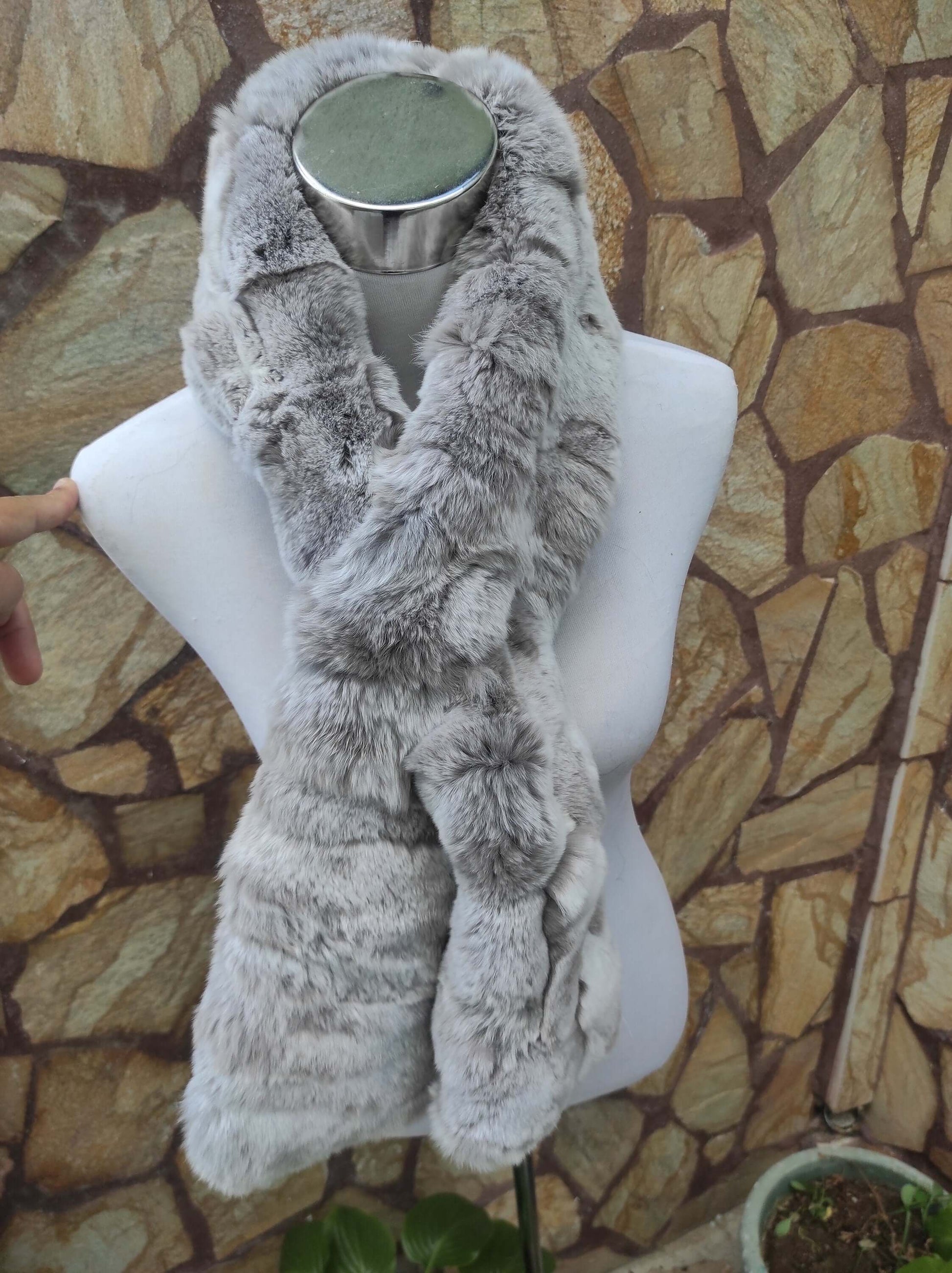 Rex Rabbit Fur Scarf Light Gray - Tatifurs displayed on a mannequin with a stone wall background.