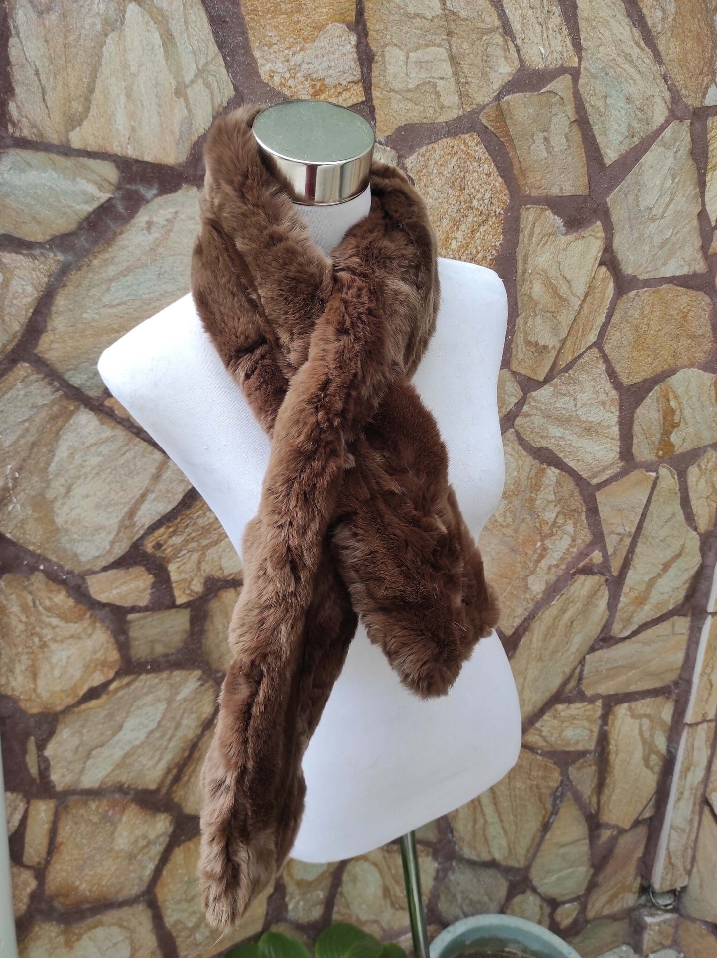 Rex Rabbit Fur Scarf Brown - Tatifurs displayed on a mannequin, showcasing its luxurious softness and warm brown tones.