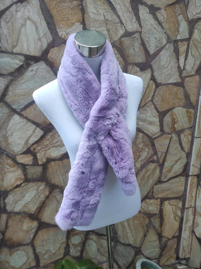 Rex Rabbit Fur Scarf Light Purple - Tatifurs displayed on a mannequin with a stone wall background.