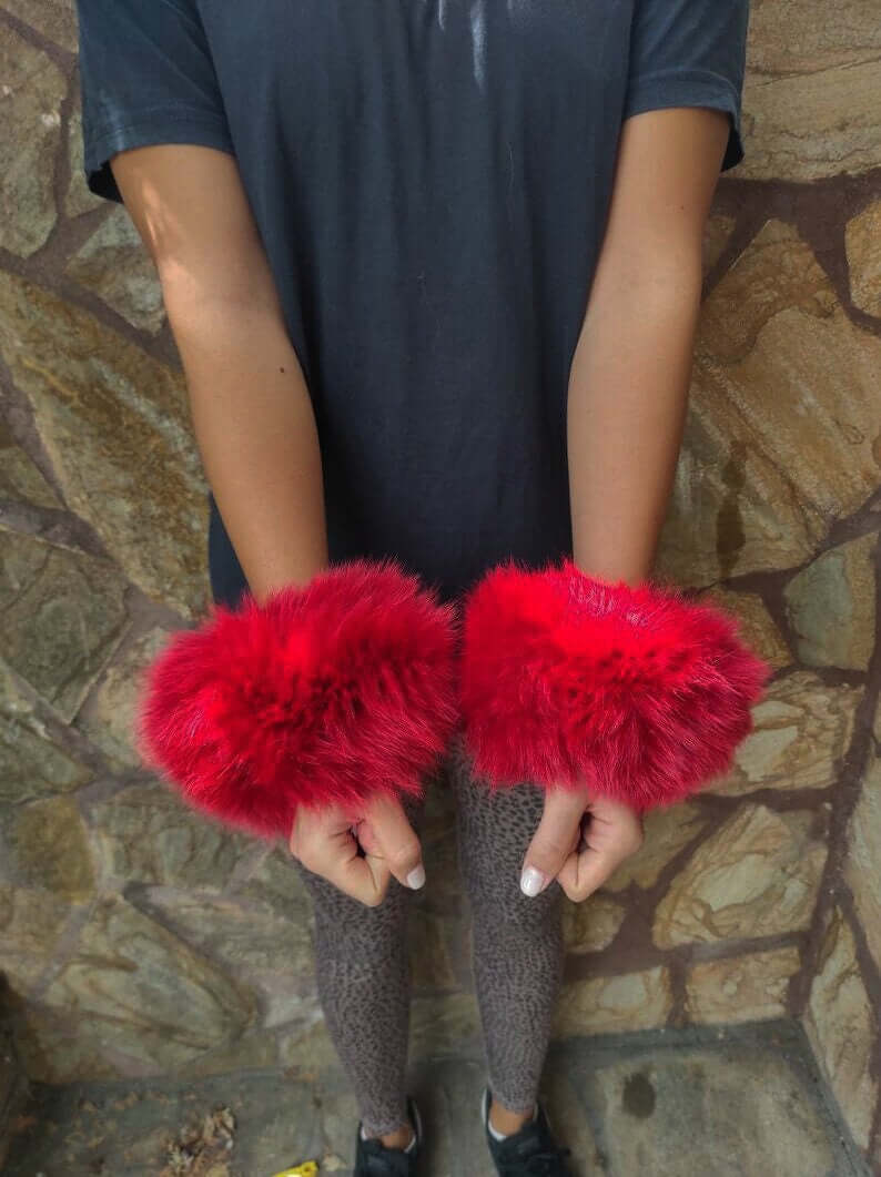 Red Fox Fur Cuffs - Tatifurs worn on wrists, vibrant red fur accessory enhancing style and flair.