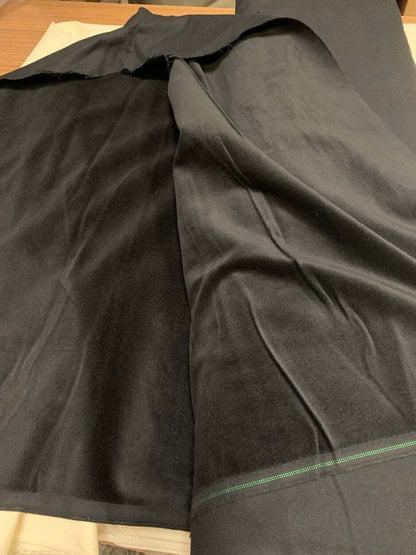 Fox Fur Blanket Throw Golden - Tatifurs fabric care and lining detail with black textile background.